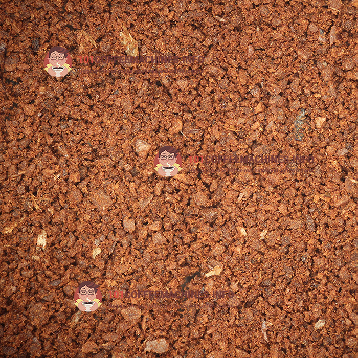 Microscope photo of coffee ground on conical burrs